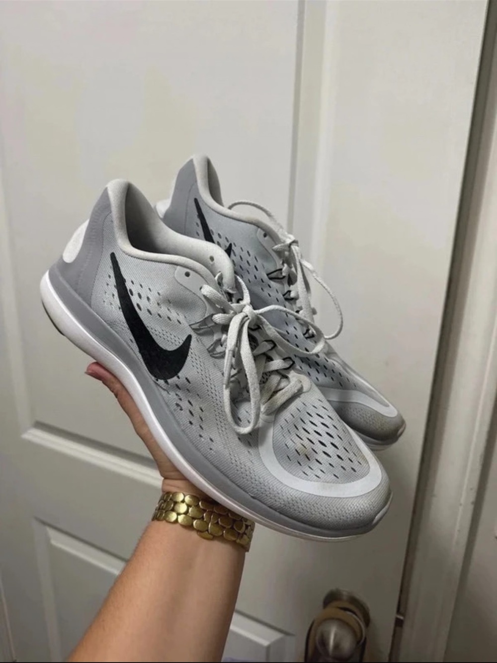 Nike Women's Light Gray Flex Run Athletic Sneakers with Black Swoosh